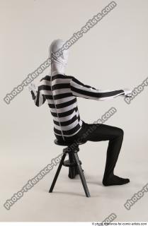 06 2019 01 JIRKA SITTING POSE WITH GUN